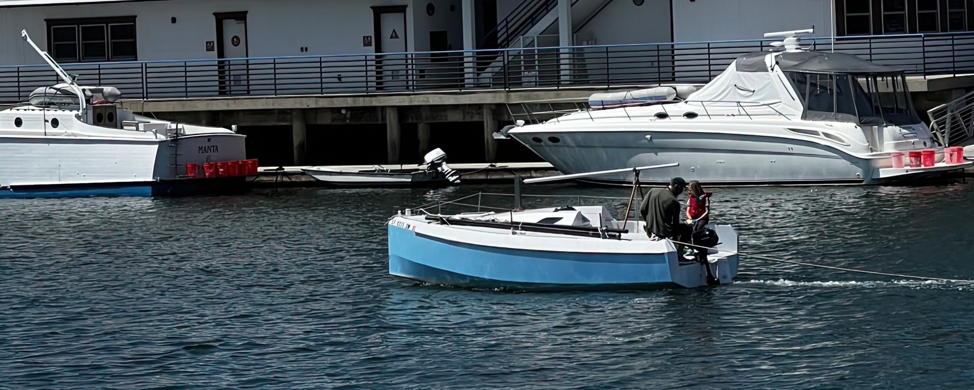 Sailboat delivery in the marina.