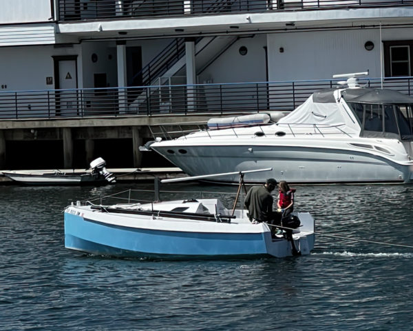 Sailboat delivery in the marina.